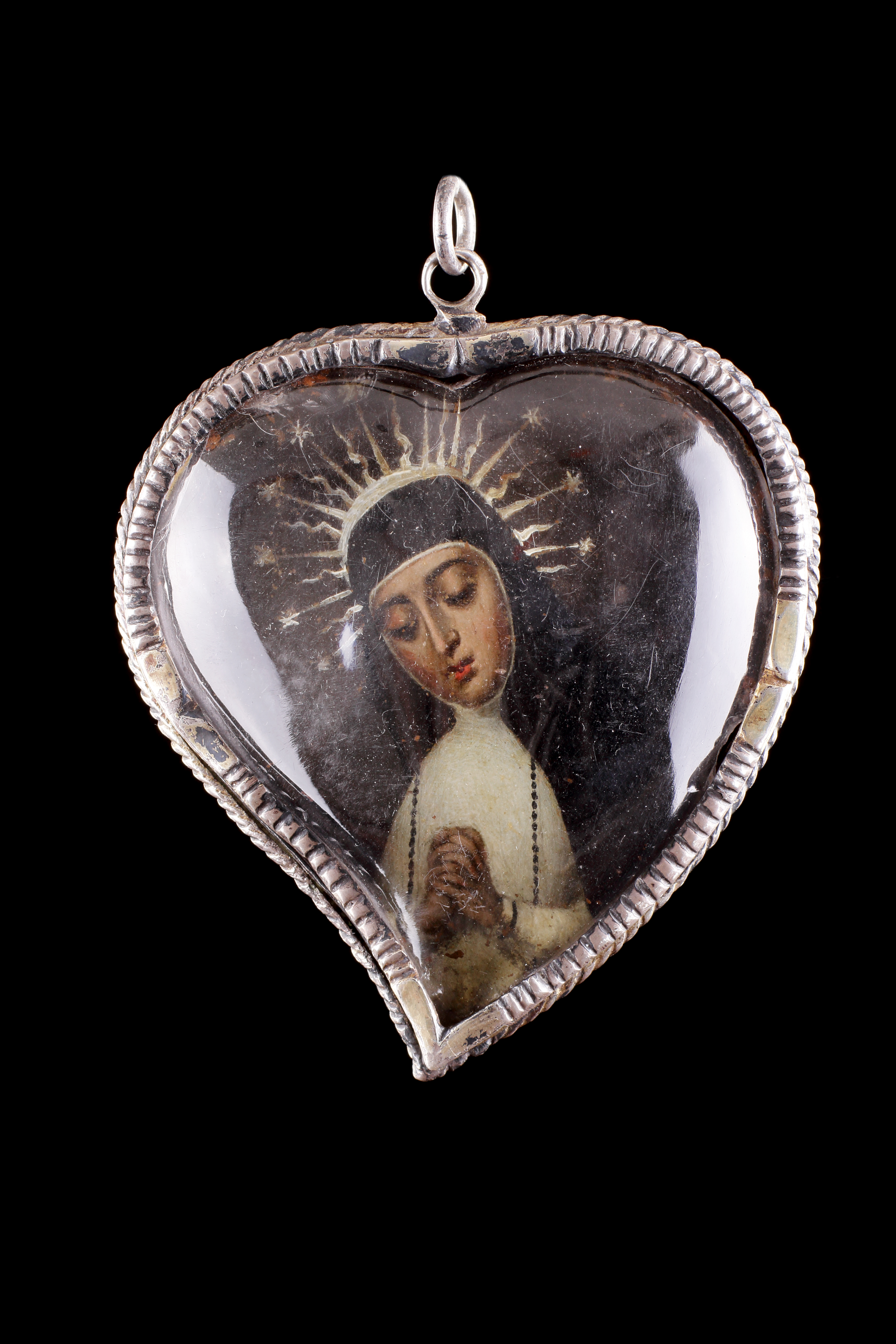 A Large Heart Shaped Rock Crystal Silver Mounted Reliquary
